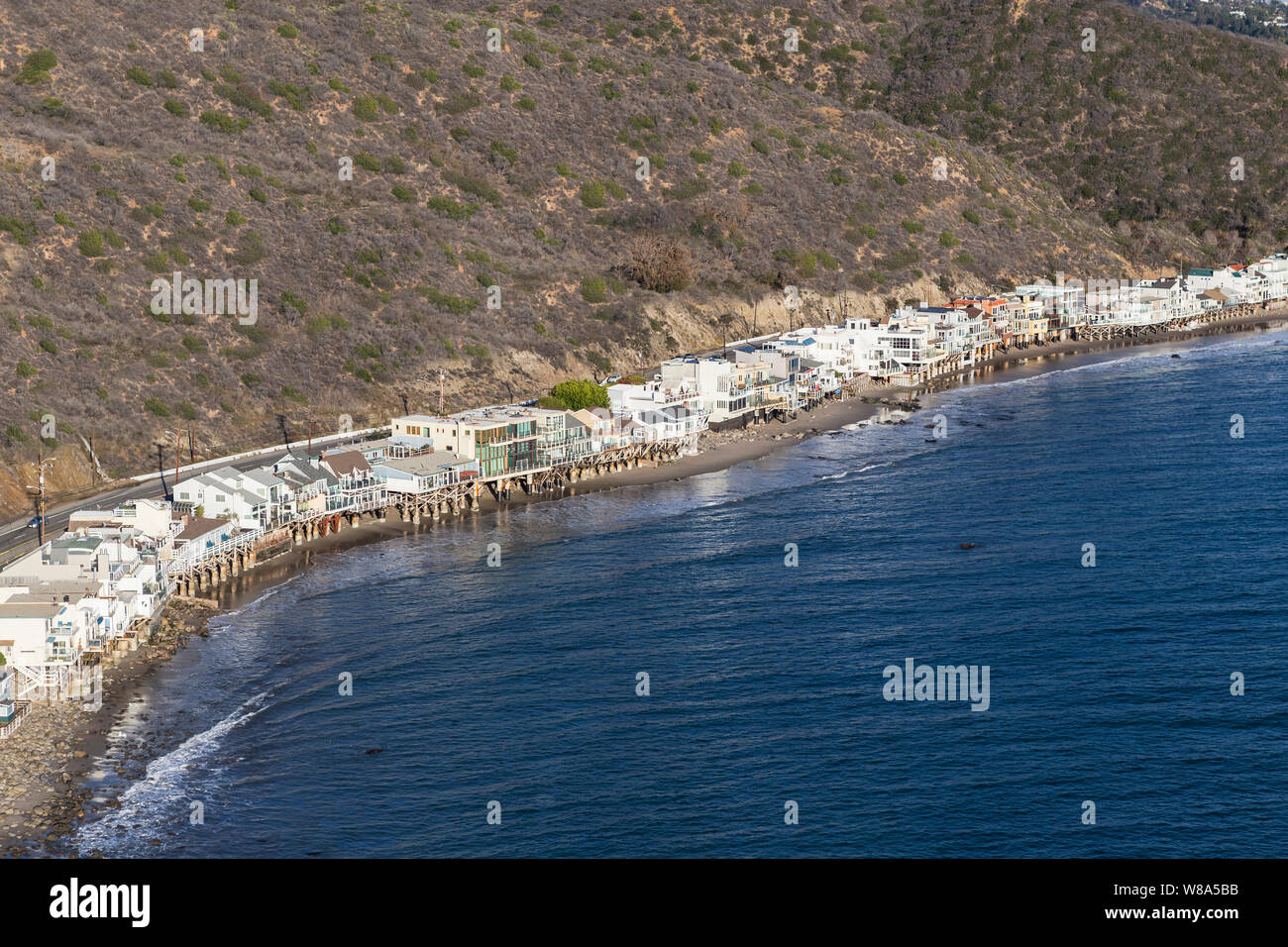 Aerial of scenic shoreline homes near Los Angeles and Santa Monica on Pacific Coast Highway in Malibu, California. Stock Photo