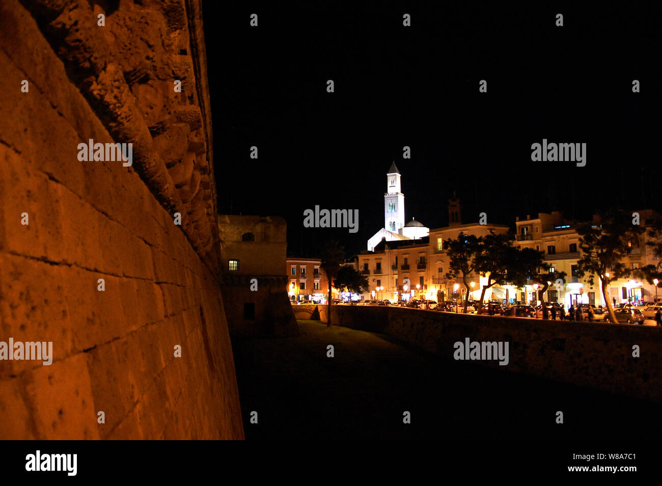 Tower of the provincial administration building seen at night from the medieval castle Castello Svevo. Bari, Apulia, Southern Italy Stock Photo