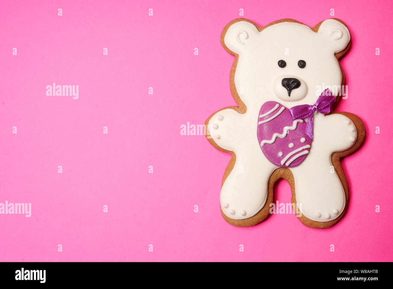 White Easter bear on pink background Stock Photo