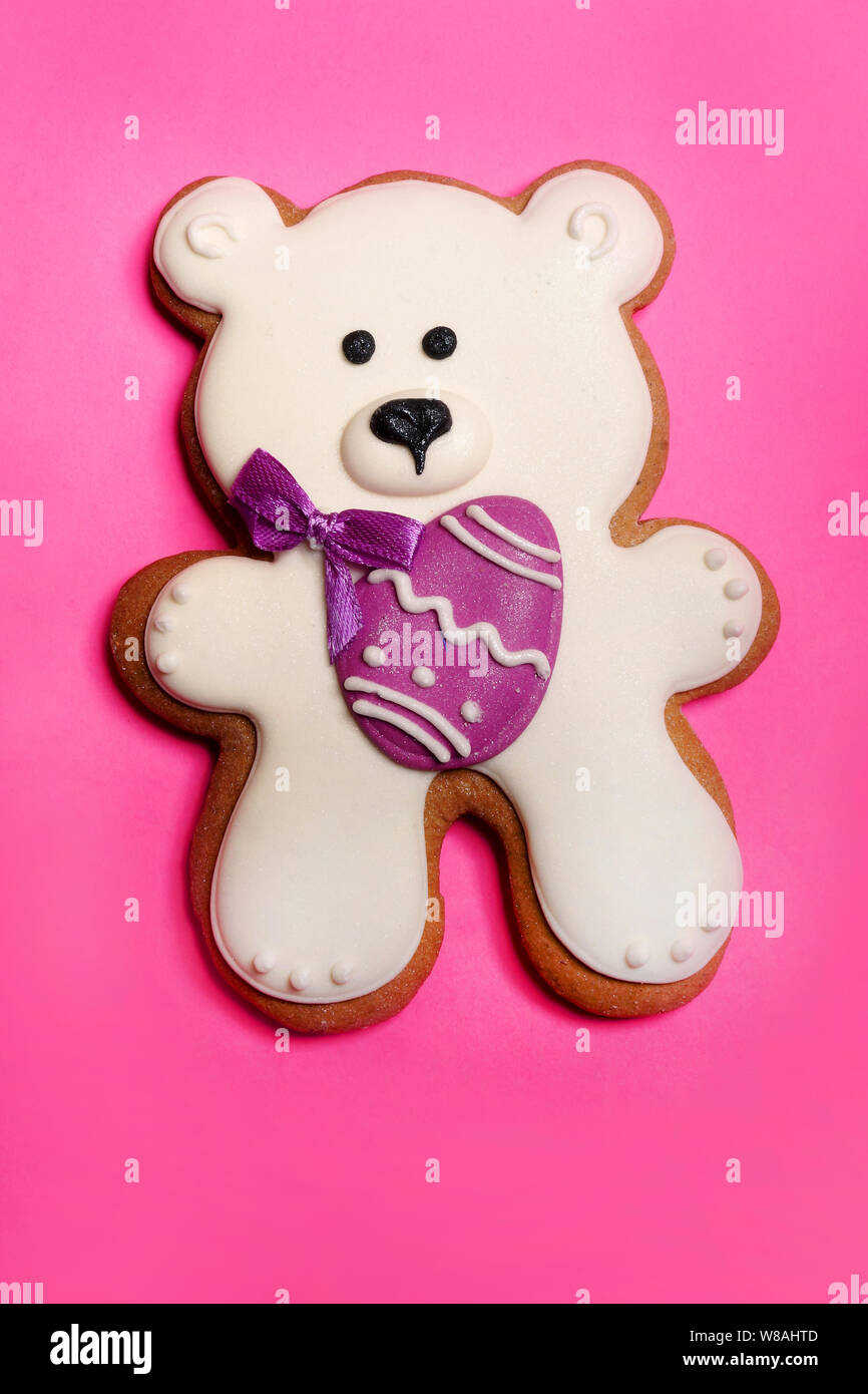 White Easter bear on pink background Stock Photo