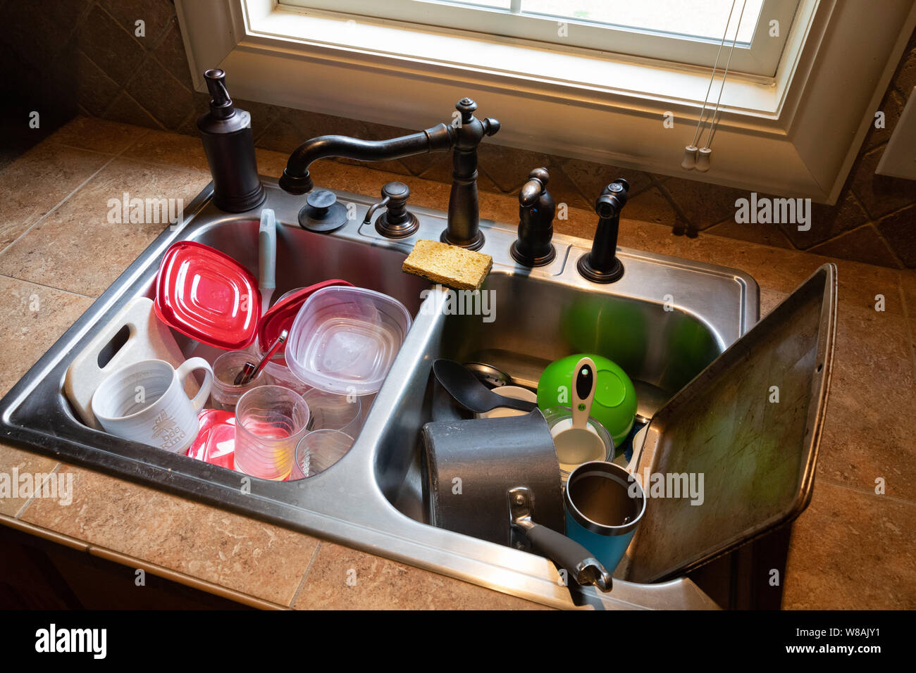 Stack of dirty dishes hi-res stock photography and images - Alamy