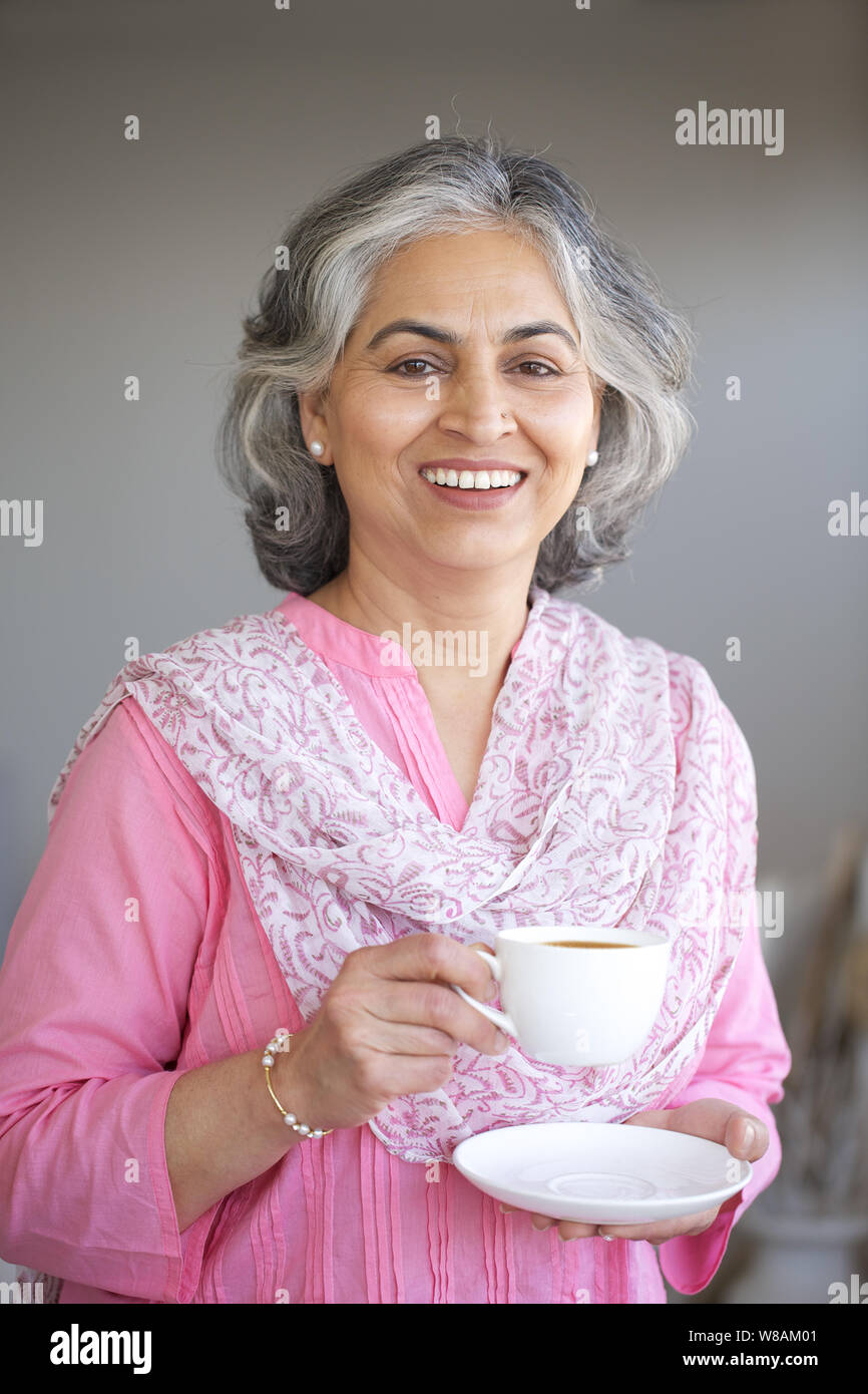 Indian senior woman tea hi-res stock photography and images - Alamy