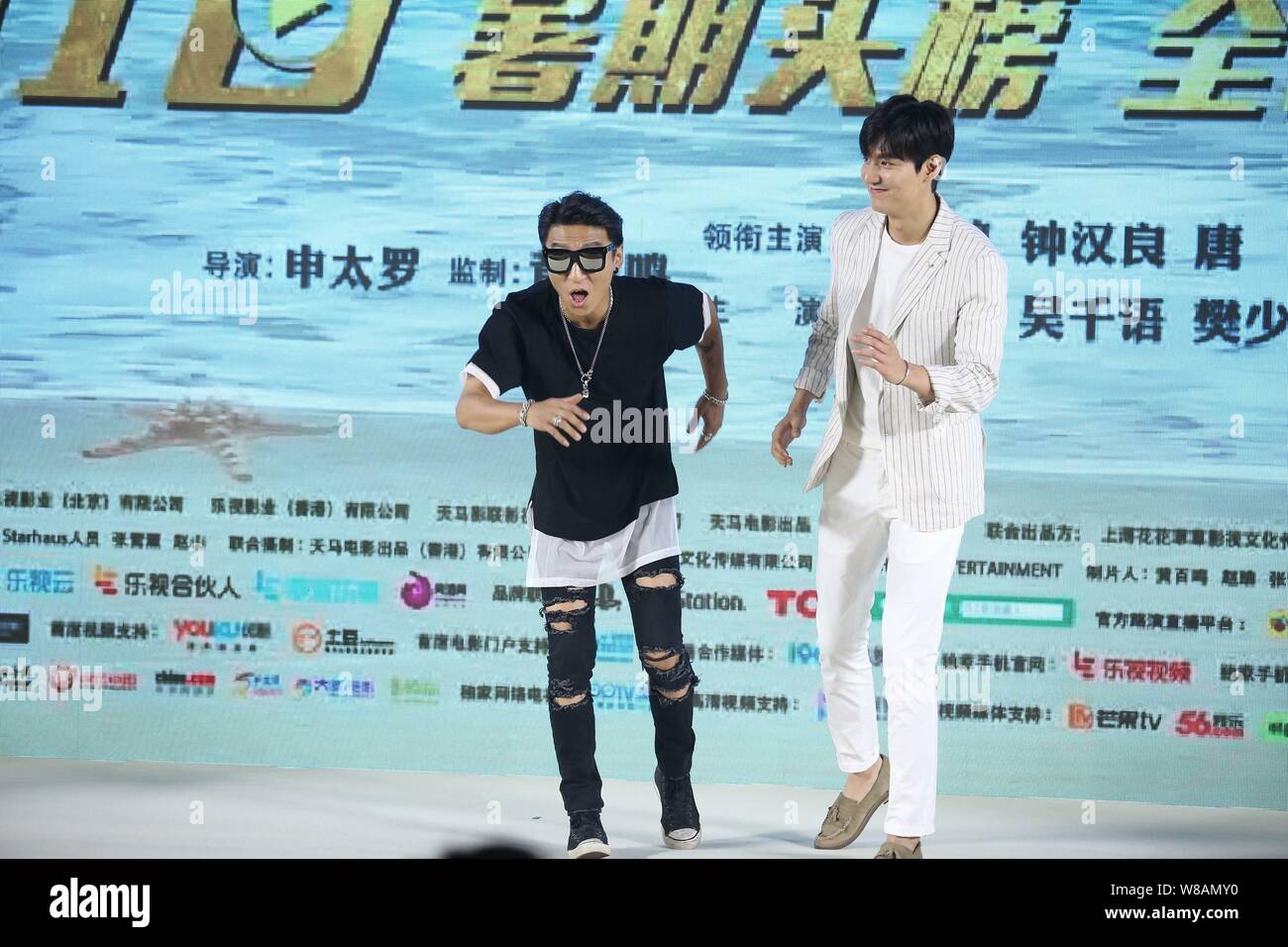 Singer Chen Yufan of Chinese band Yuquan, left, and South Korean actor ...