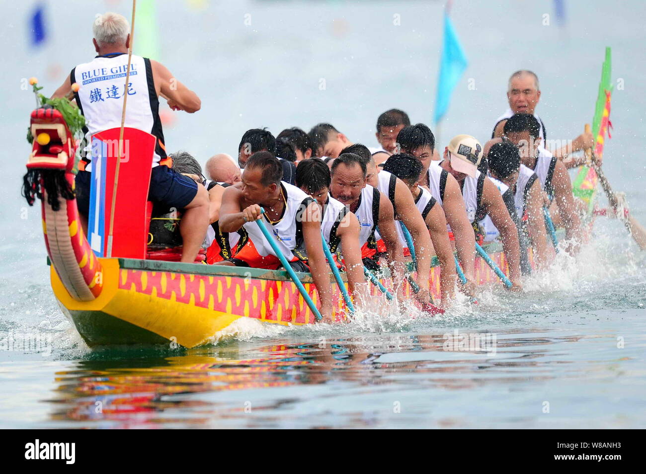 Participants compete in a dragon boat race held to celebrate the Dragon