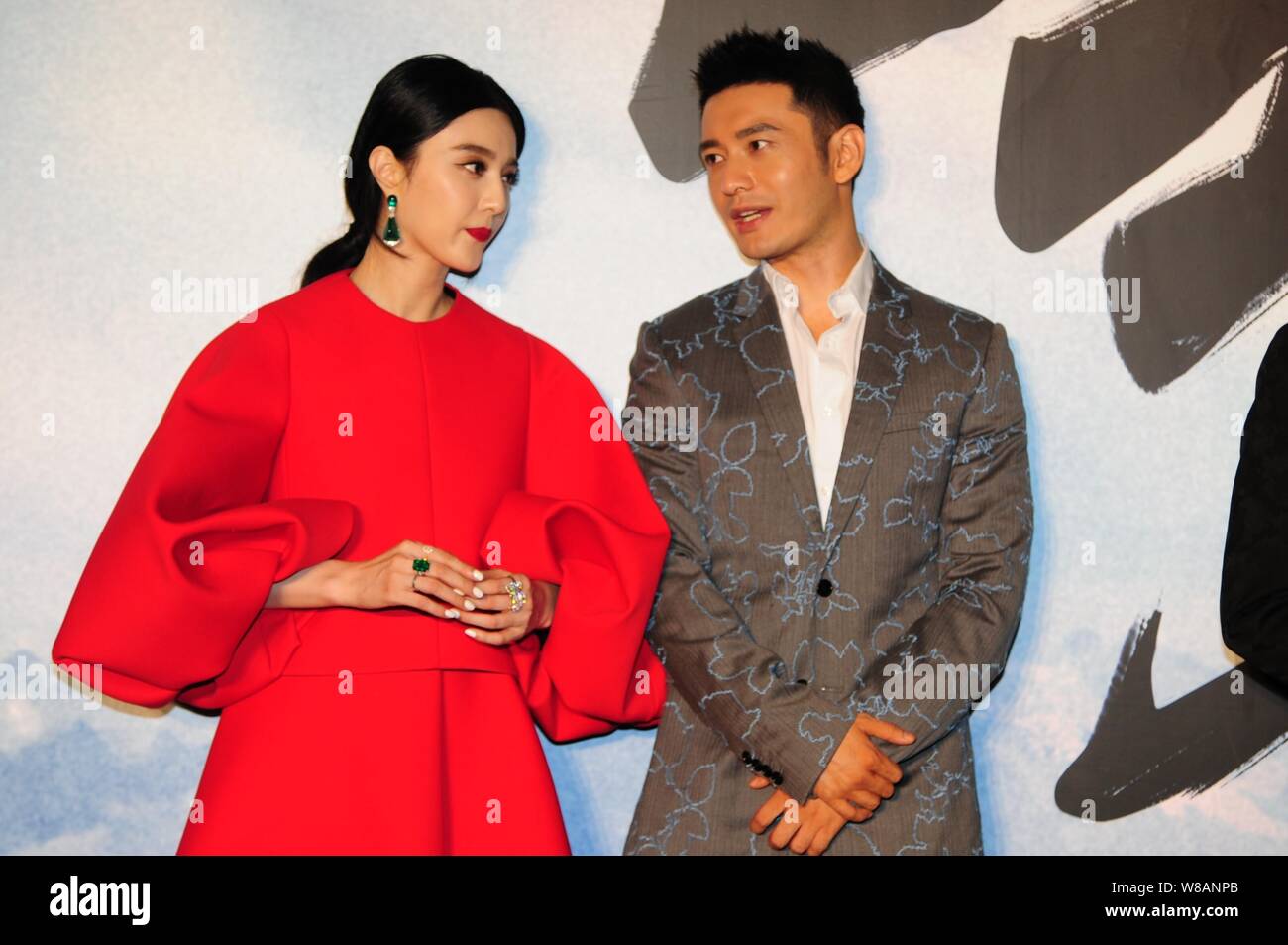 Chinese actress Fan Bingbing, left, and actor Huang Xiaoming attend a