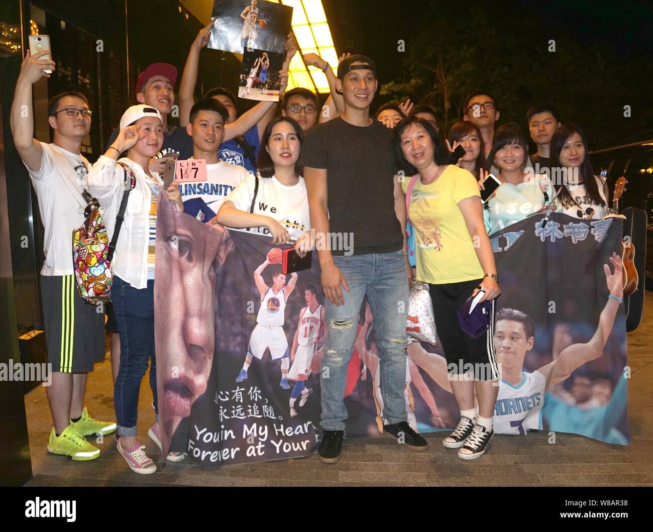 Jeremy Lin Fans NBA basketball star Jeremy Lin of Charlotte Hornets, center, poses for ...