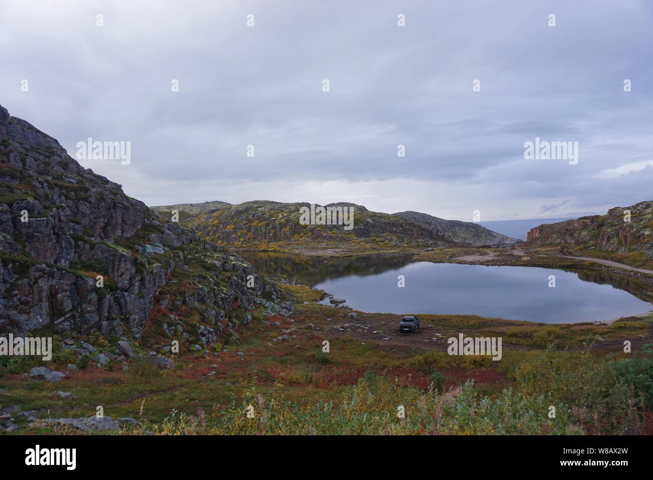 The view of tundra and a water body in Teriberka, Russia Stock Photo