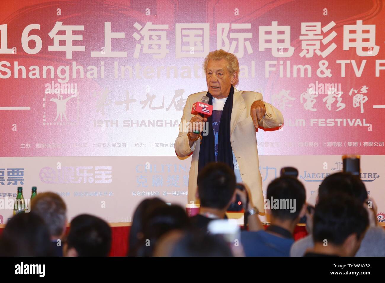 English actor Sir Ian McKellen speaks at a press conference to promote the British Council's 'Shakespeare Lives' program during the 19th Shanghai Inte Stock Photo