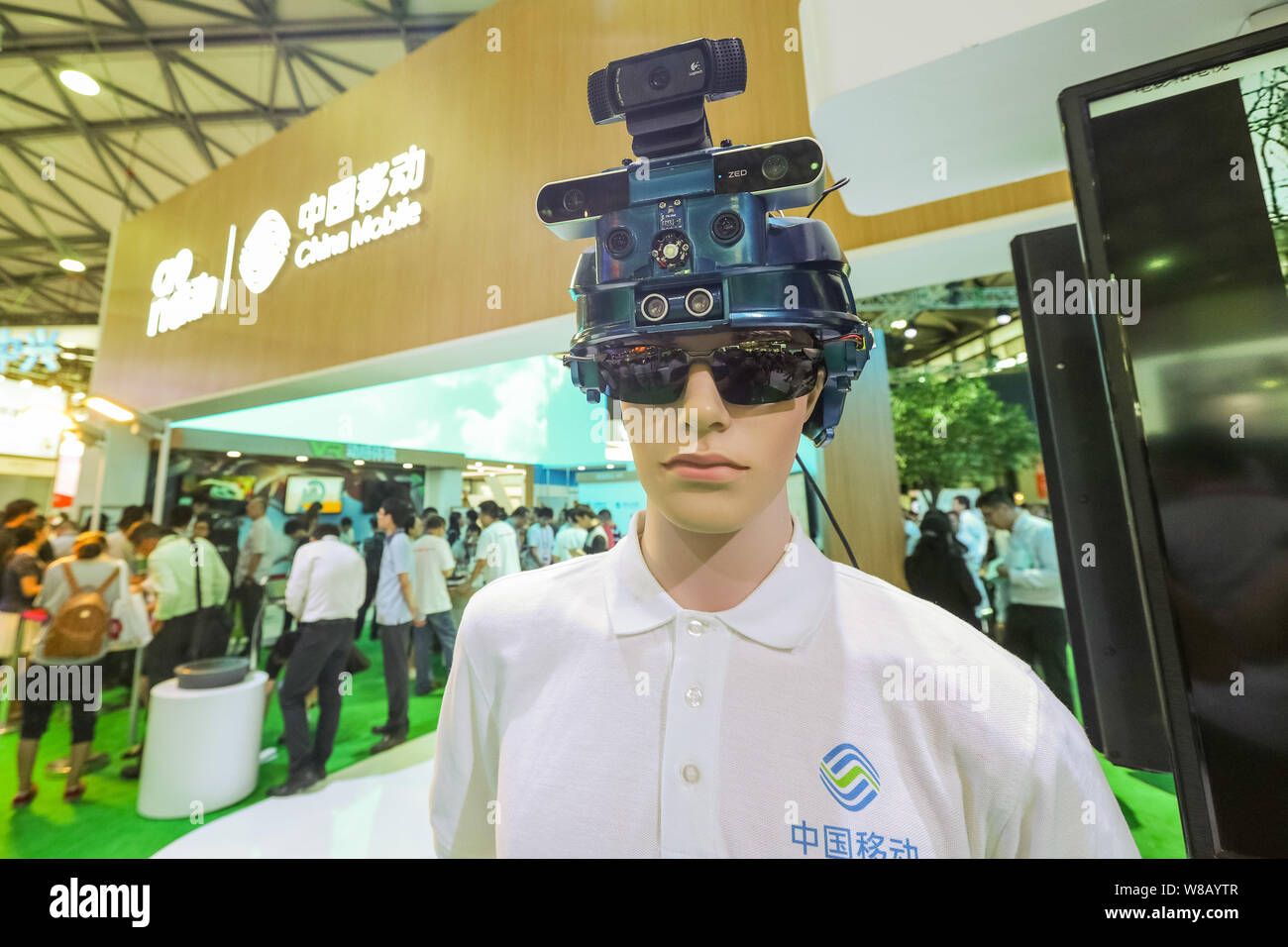 A VR (Virtual Reality) device is on display at the stand of China Mobile during the 2016 Mobile World Congress (MWC) in Shanghai, China, 29 June 2016. Stock Photo