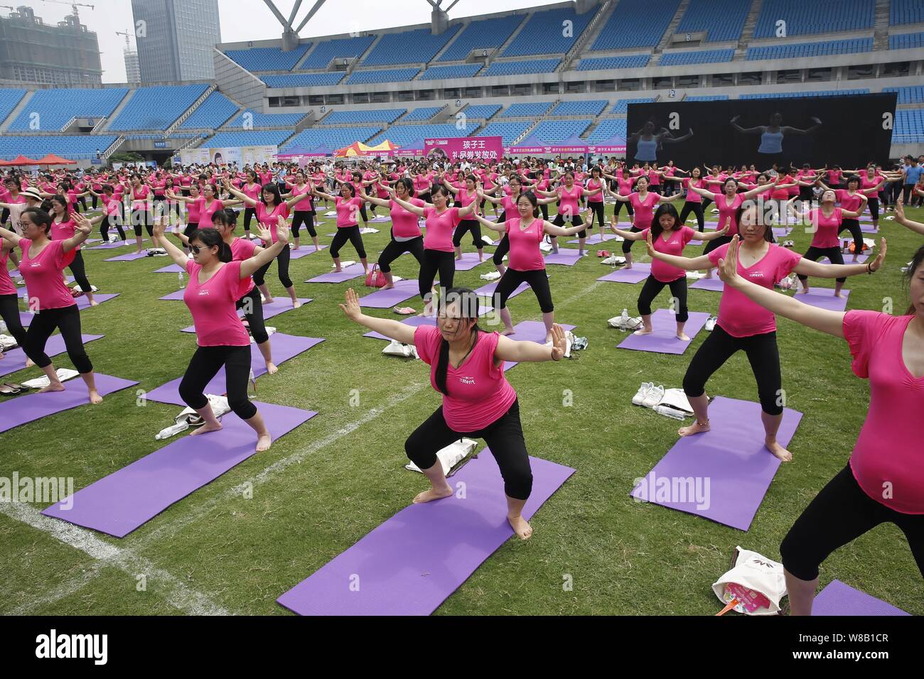 Pregnant women practise yoga to set a new Guinness World Record