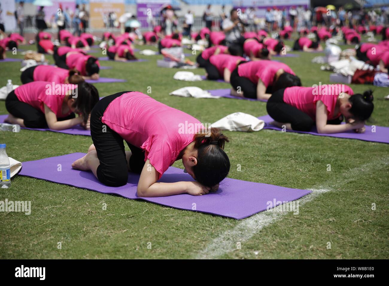 Pregnant women practise yoga to set a new Guinness World Record for the  largest prenatal yoga class at a stadium in Hefei city, east China's Anhui  pro Stock Photo - Alamy