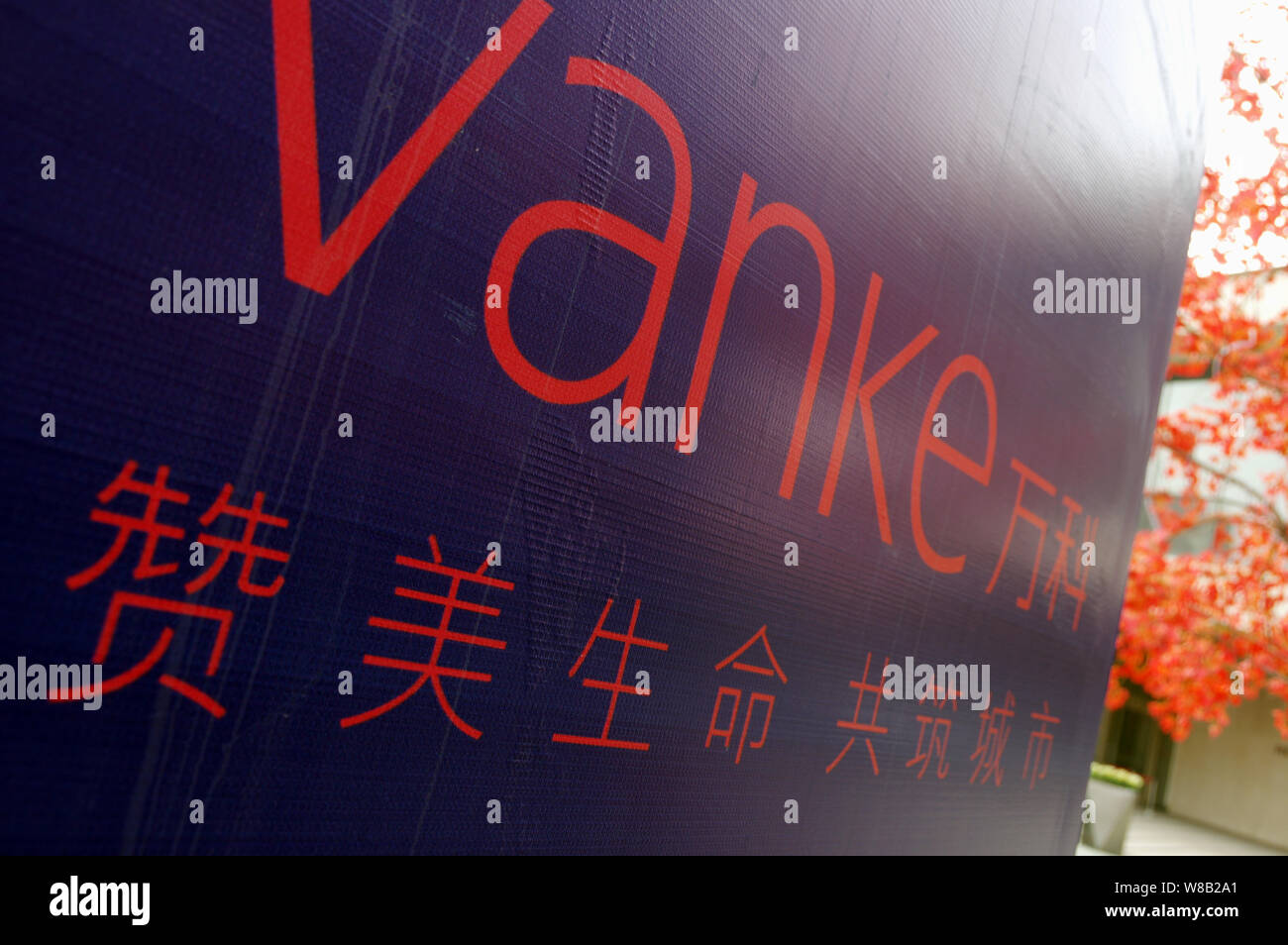 FILEAn advertisement of Chinese real estate developer Vanke is