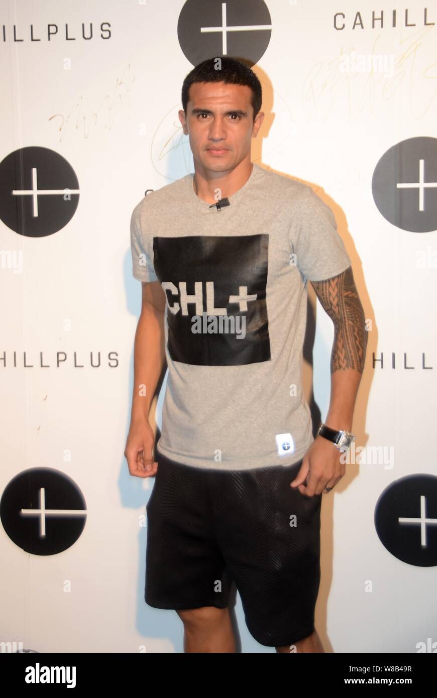 Australian football star Tim Cahill poses at a fashion show of his own