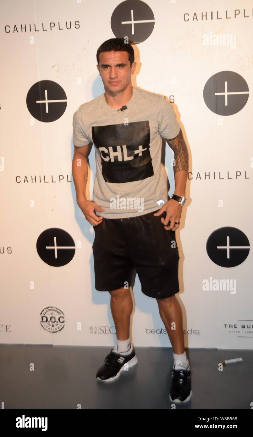 Australian football star Tim Cahill poses at a fashion show of his own