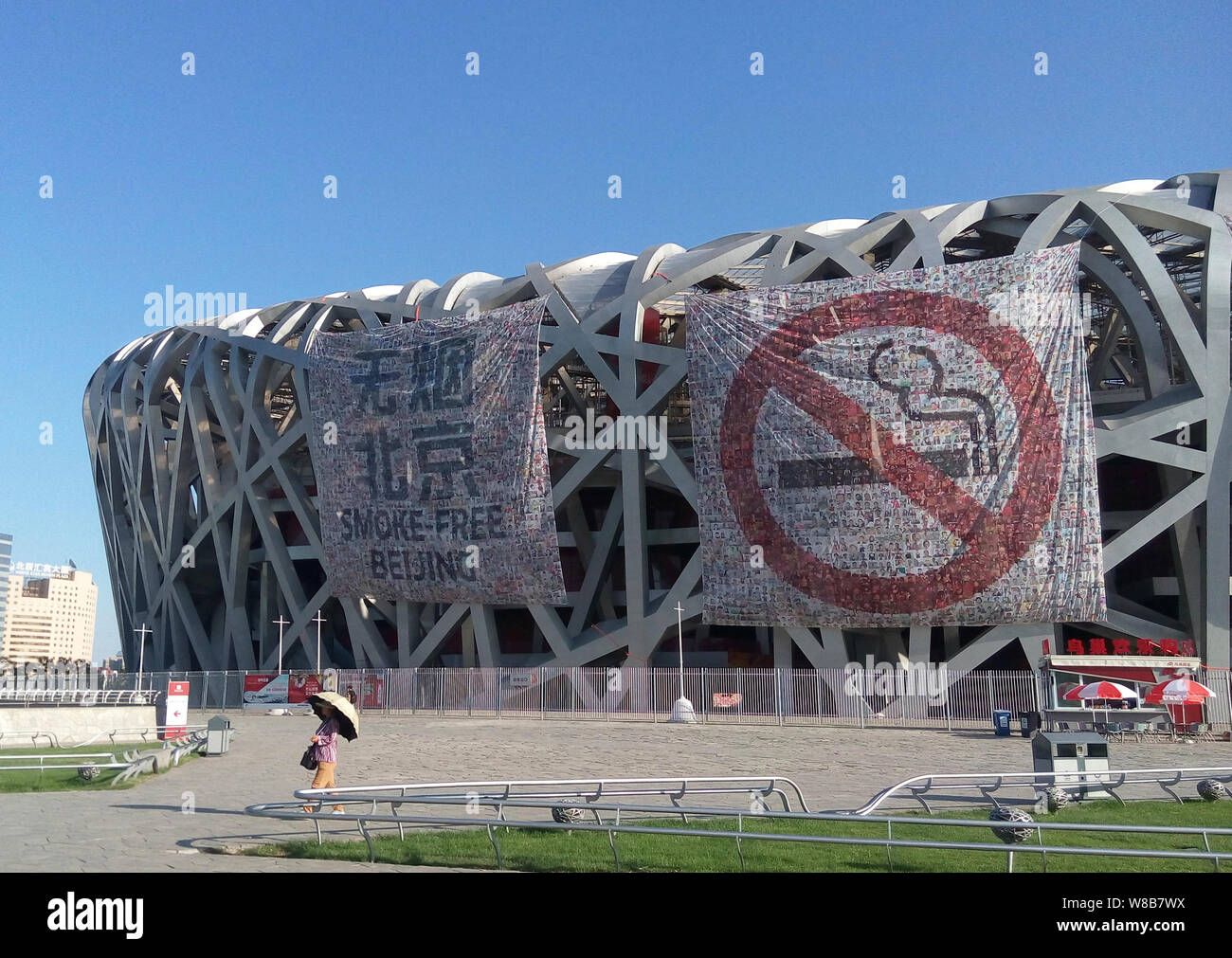 View of anti-smoking banners displayed on the Beijing National Stadium,  also known as the Bird's Nest, ahead of World No Tobacco Day in Beijing,  China Stock Photo