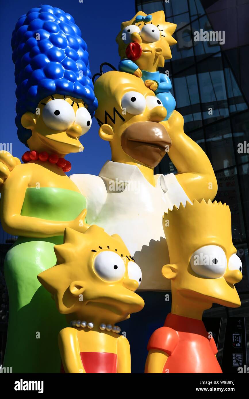 Model figures of The Simpsons are on display in front of The Simpsons Store at the Taikoo Li Sanlitun shopping center in Beijing, China, 10 May 2016. Stock Photo