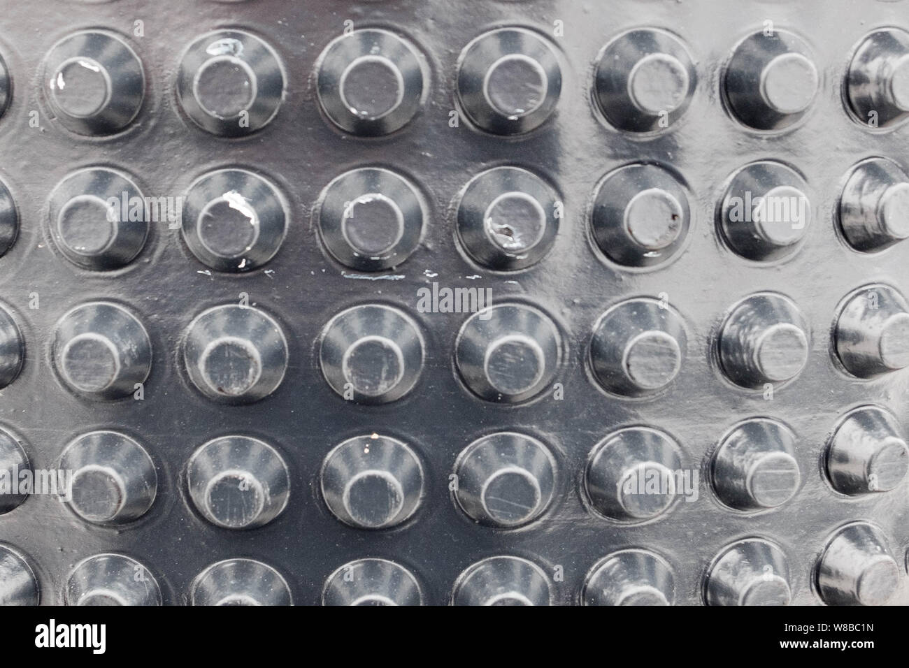 Surface of hydro insulation membrane waterproofing black material. Stock Photo