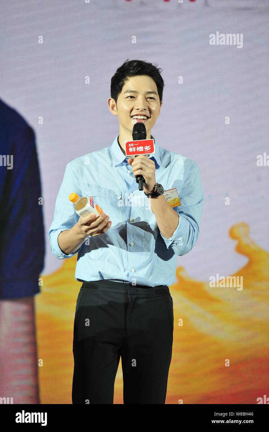 South Korean actor Song Joong-ki attends a promotional event for Uni-President Enterprises' Orangeate orange juice in Beijing, China, 13 May 2016. Stock Photo