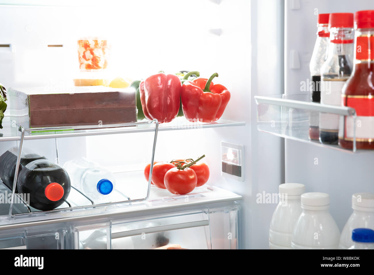Photos Of An Open Refrigerator Full Of Healthy Foods Stock Photo