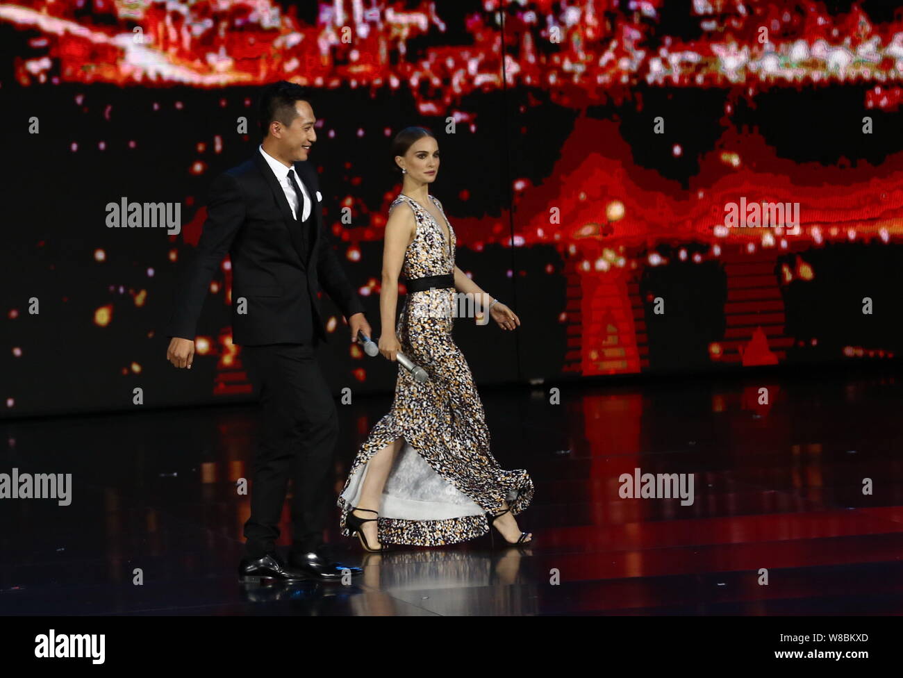 American Actress Natalie Portman Right And Chinese Actor Liu Ye Step Onto The Stage During The Opening Ceremony Of The Sixth Beijing International F Stock Photo Alamy alamy