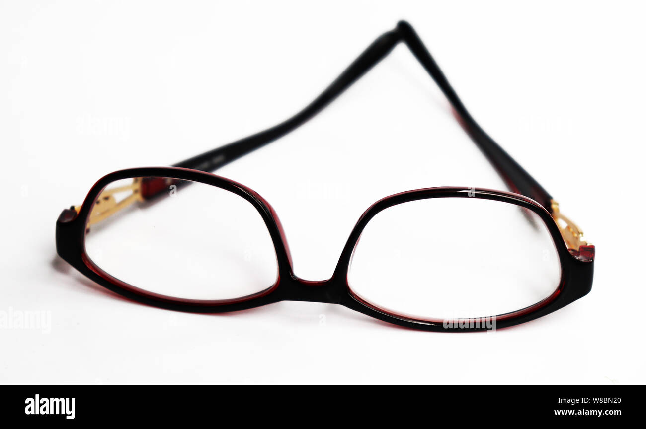 Red frame glasses isolated on white background. Stylish Eye Glasses Stock Photo