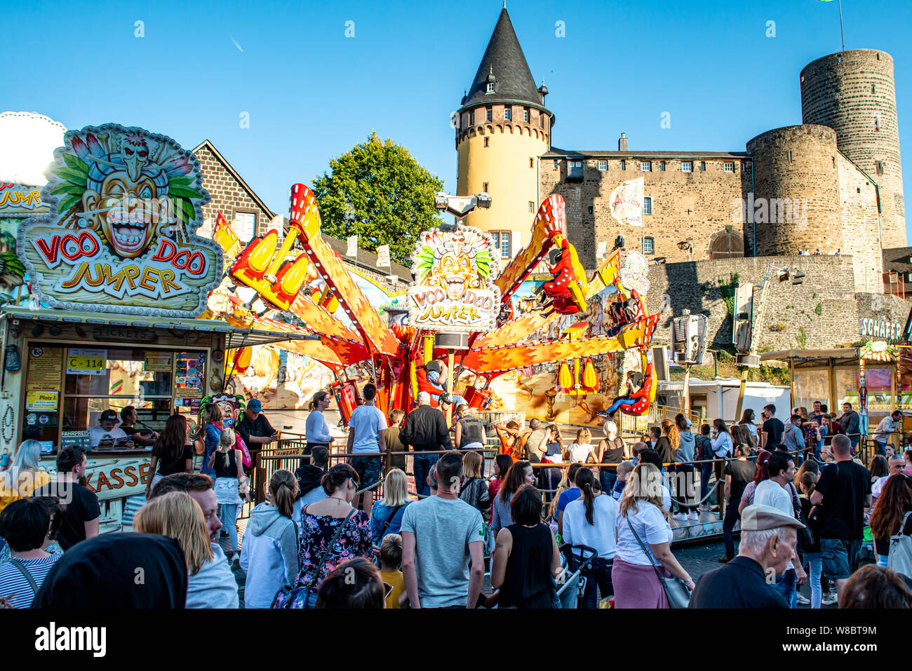 Mayen Germany 14.10.2018 people fairground huge carousel swing ride at biggest folk festival in Rhineland Palantino the lukasmarkt in Mayen. Stock Photo