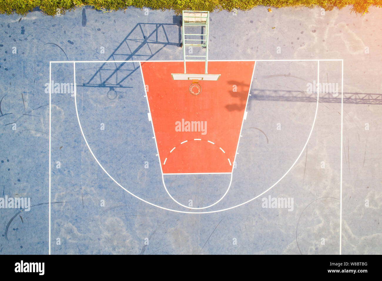 Aerial view, Top View, Bird eye view of school college with Basketball courts. basketball field in morning right. Stock Photo