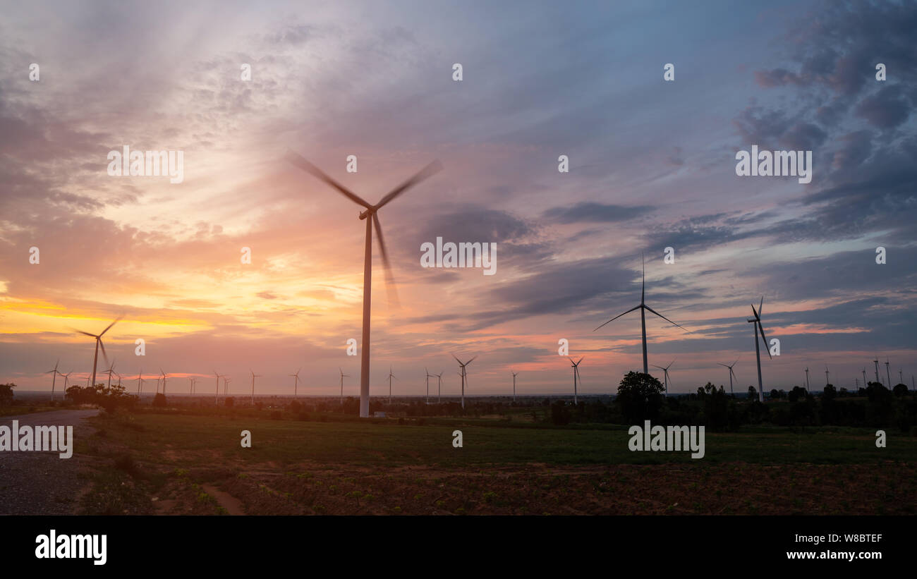 Silhouette large wind turbines at sunrise taken from the air. wind ...