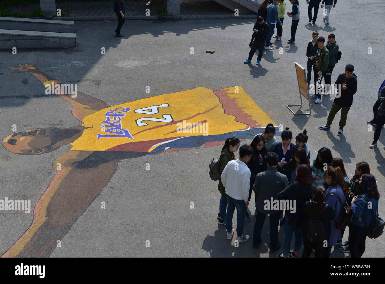 Chinese Students Look At The Giant Portrait Painting Of Nba