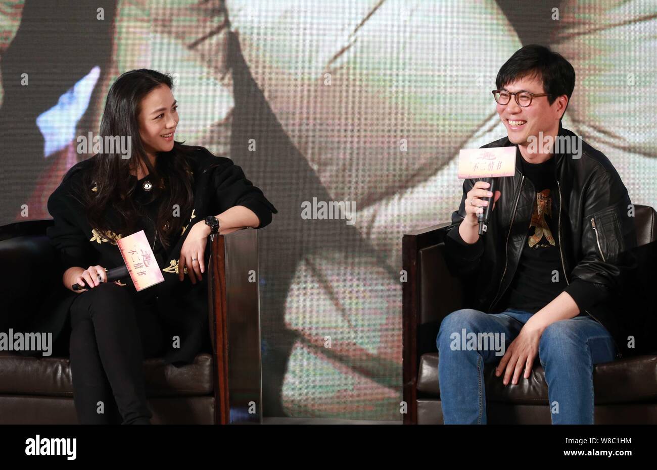 Chinese actress Tang Wei, left, and her South Korean director husband