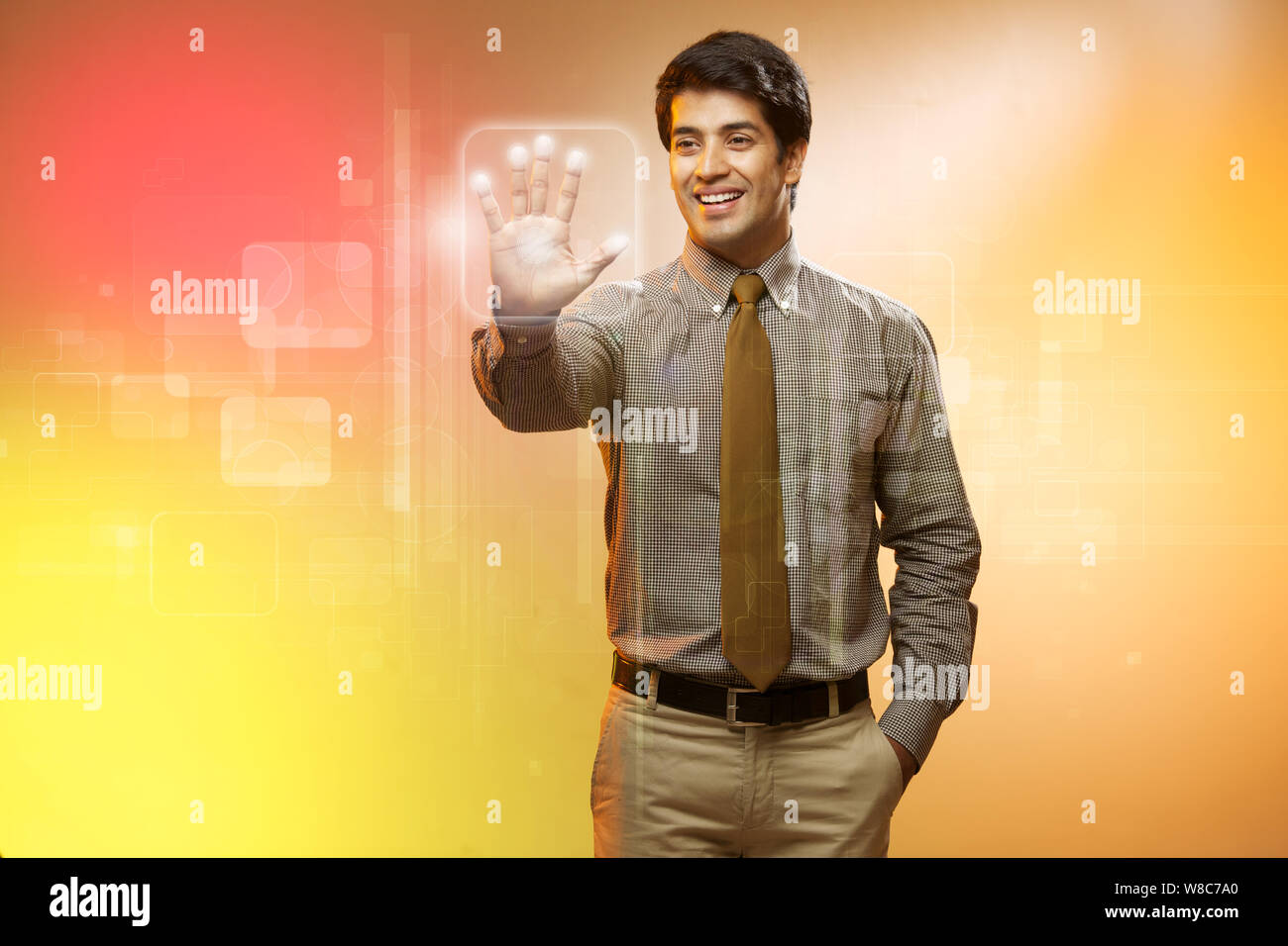 Businessman using a touch screen for biometrics identification Stock Photo
