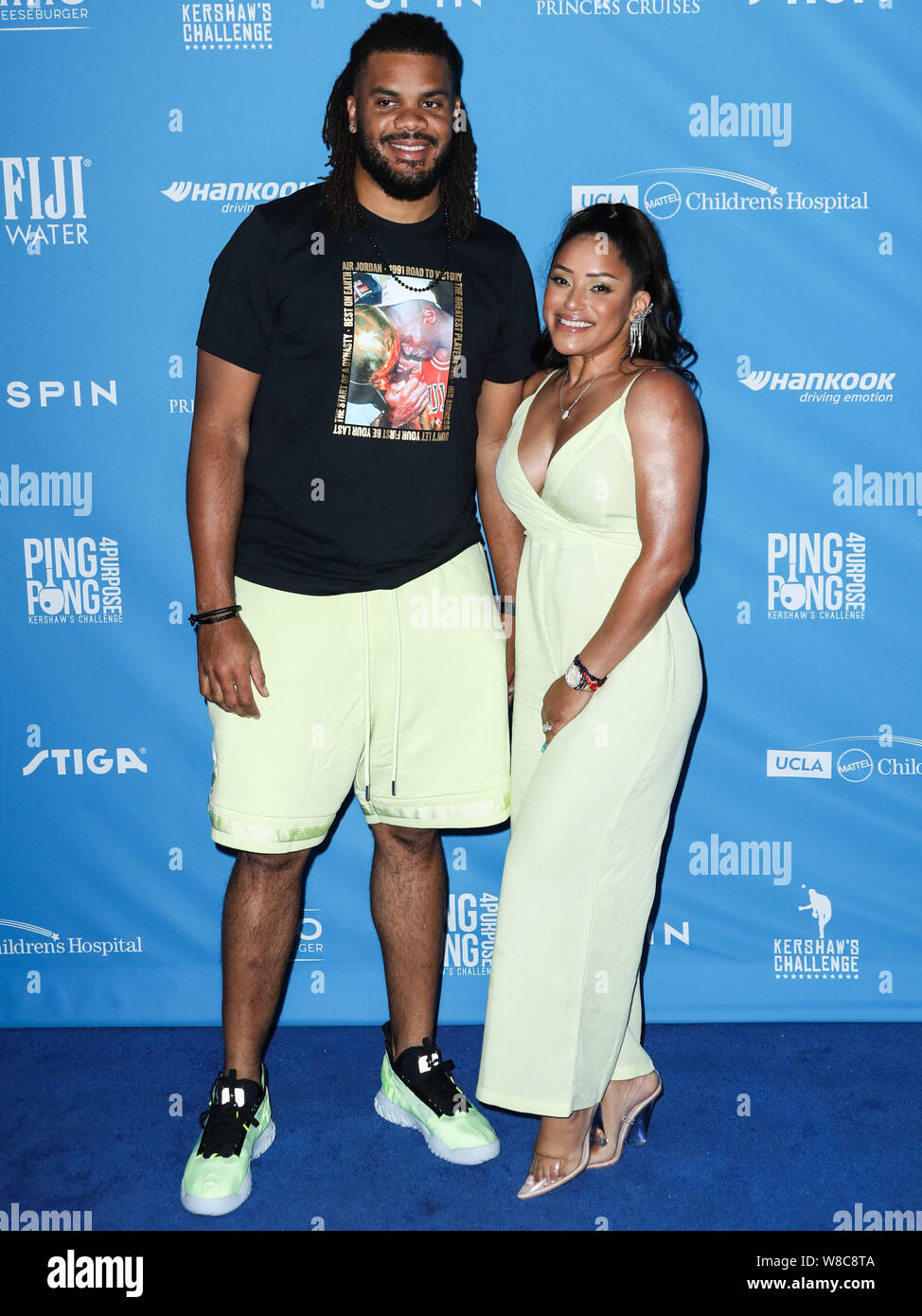 Los Angeles, United States. 08th Aug, 2019. LOS ANGELES, CALIFORNIA, USA -  AUGUST 08: Professional baseball pitcher Kenley Jansen and wife Gianni  Jansen arrive at Clayton Kershaw's 7th Annual Ping Pong 4