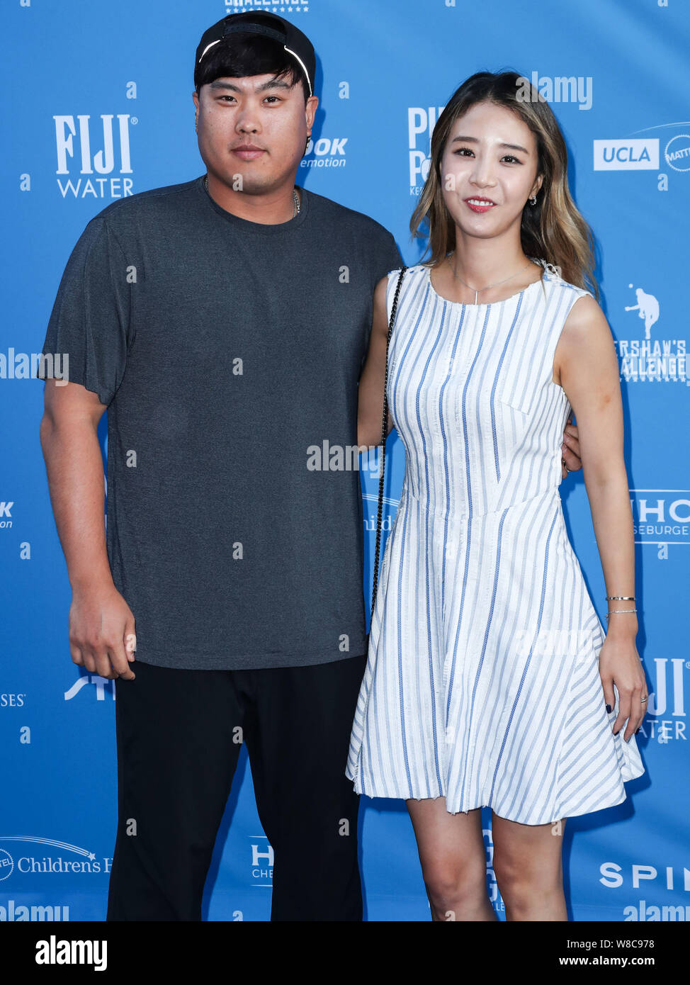 los-angeles-united-states-08th-aug-2019-los-angeles-california-usa-august-08-professional-baseball-pitcher-hyun-jin-ryu-and-wife-ji-hyun-bae-arrive-at-clayton-kershaws-7th-annual-ping-pong-4-purpose-fundraiser-held-at-dodger-stadium-on-august-8-2019-in-los-angeles-california-united-states-photo-by-xavier-collinimage-press-agency-credit-image-press-agencyalamy-live-news-W8C978.jpg