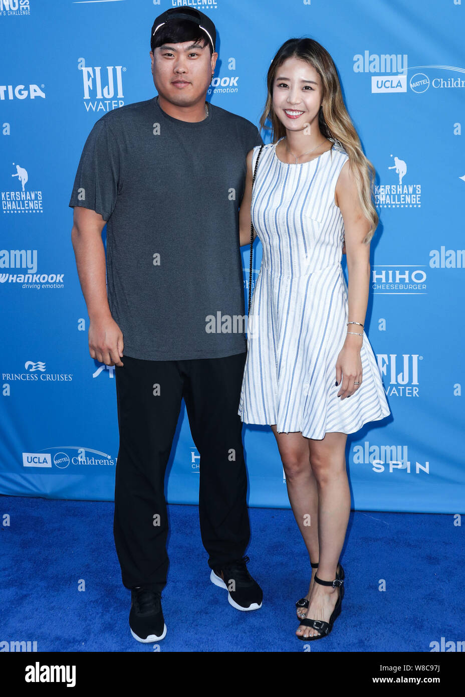 Los Angeles, United States. 08th Aug, 2019. LOS ANGELES, CALIFORNIA, USA -  AUGUST 08: Professional baseball pitcher Hyun-jin Ryu and wife Ji-Hyun Bae  arrive at Clayton Kershaw's 7th Annual Ping Pong 4