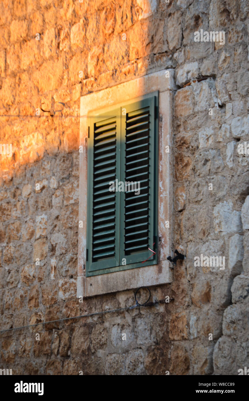 Old house sunlight shutters hi-res stock photography and images - Alamy