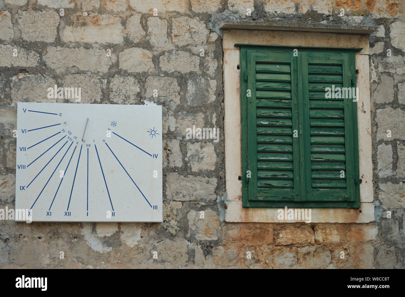 Shutter Clocks Stone house green shutters hi-res stock photography and images - Alamy