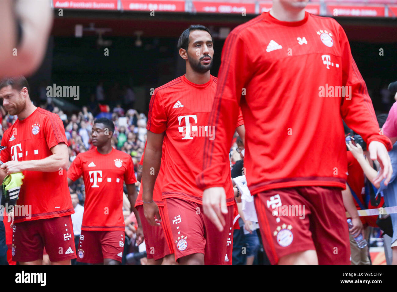 Medhi Benatia of Bayern Munich FC, center, arrives at a training session for the Audi Football Summer Tour China 2015 in Beijing, China, 17 July 2015. Stock Photo