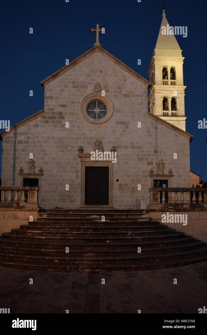 Night photography, stone Church of Annunciation at Supetar, Brač island, Croatia Stock Photo
