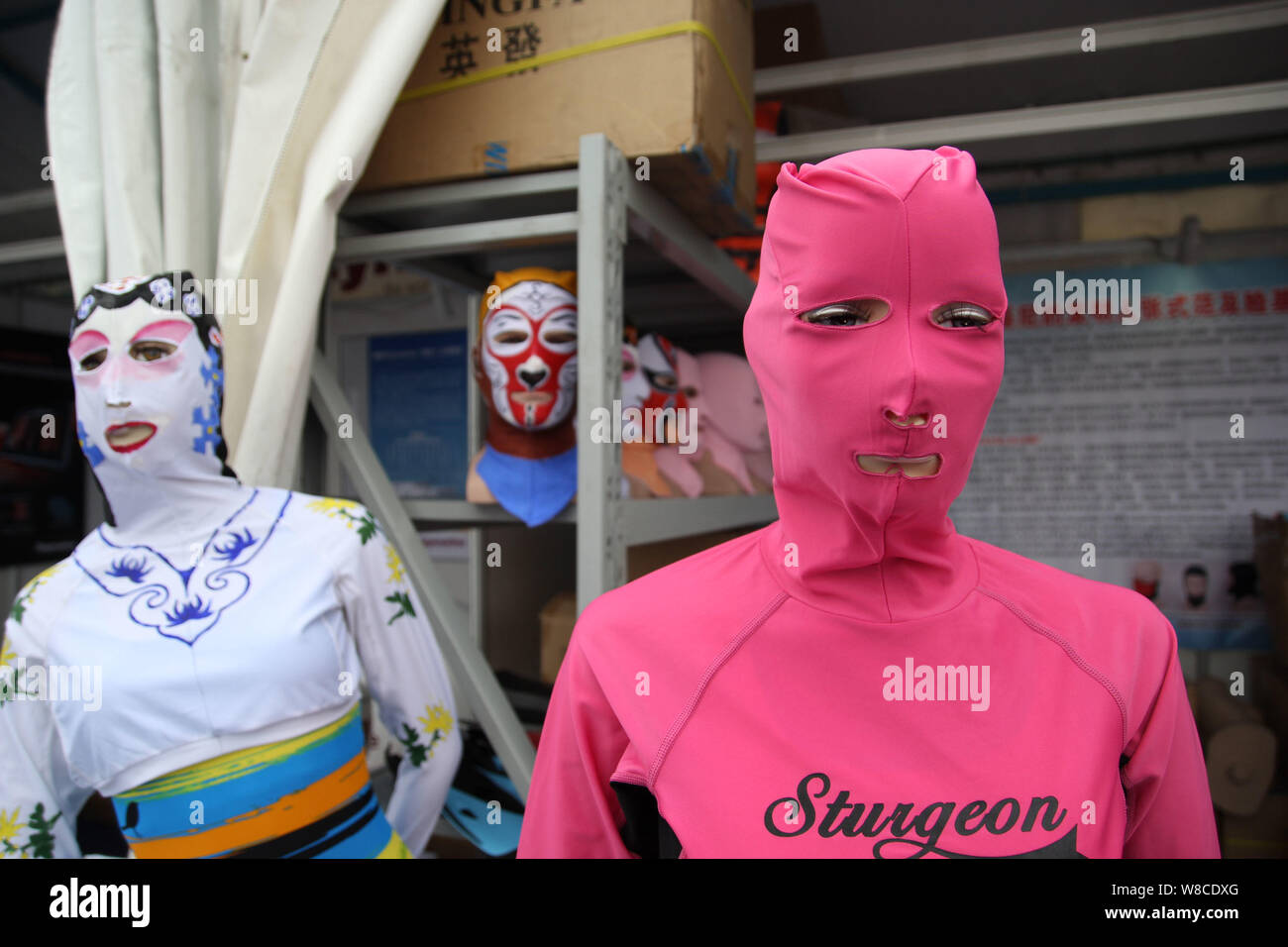 Facekini masks by Chinese facekini designer Zhang Shifan are on display