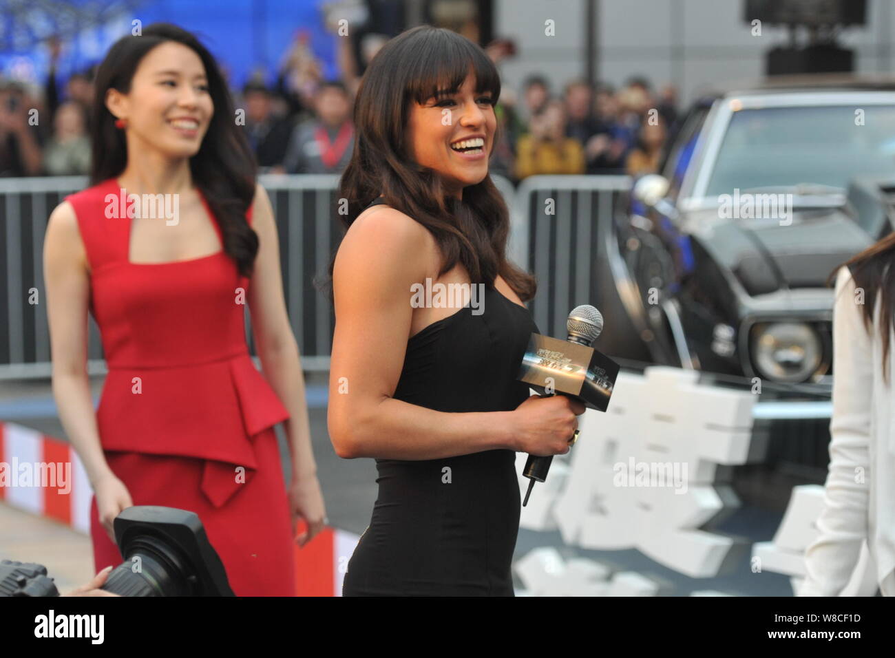 American actress Michelle Rodriguez arrives for a premiere event for her movie 'Furious 7' in Beijing, China, 26 March 2015. Stock Photo