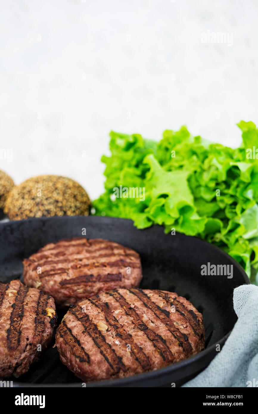 Ingredients for burger. Beef meat cooked on the grill Stock Photo Alamy