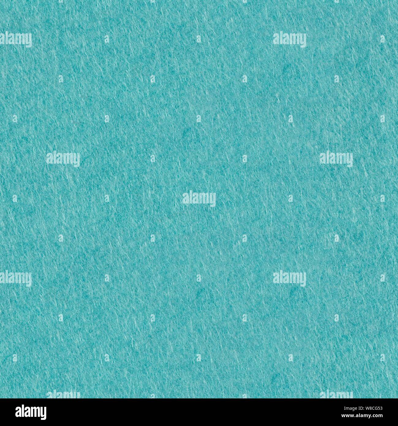Light blue coloured felt texture. Seamless square background, tile ready. Stock Photo