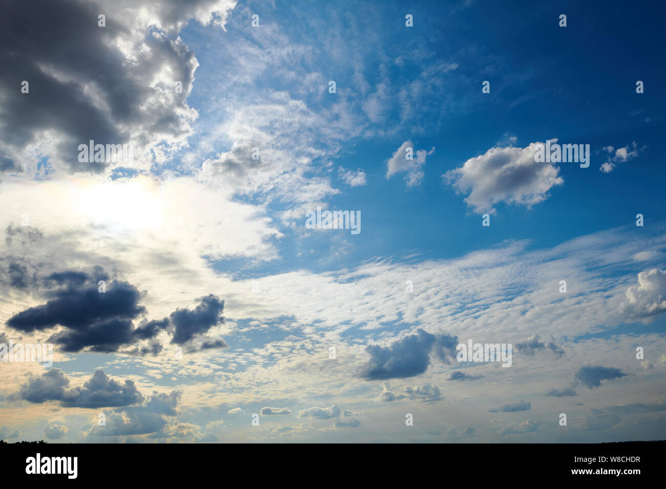 Dark blue sky with clouds for background or texture Stock Photo - Alamy