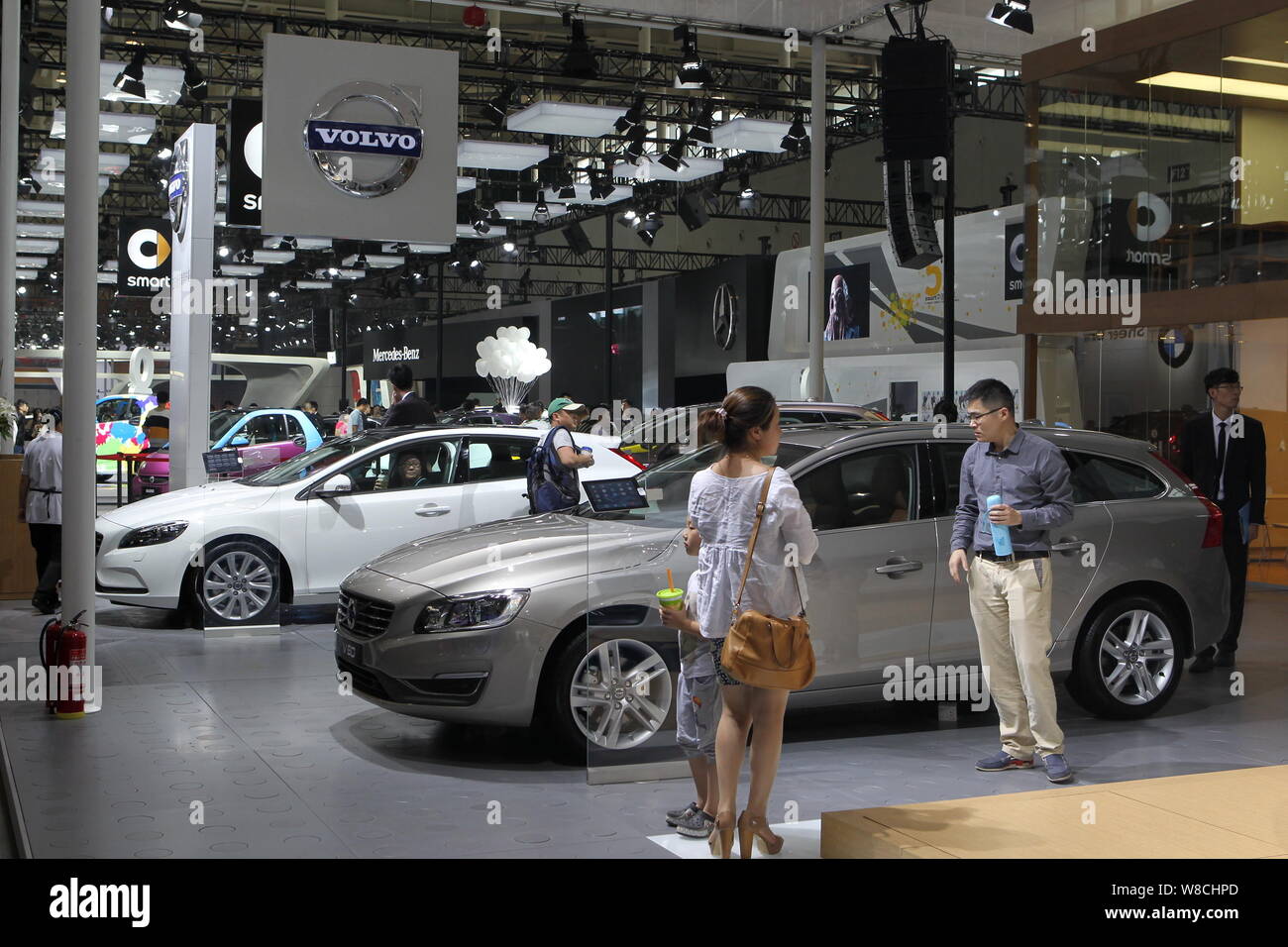 --FILE--People visit the stand of Volvo during an automobile exhibition in Nanjing city, east Chinas Jiangsu province, 3 October 2014.   Sweden-based Stock Photo