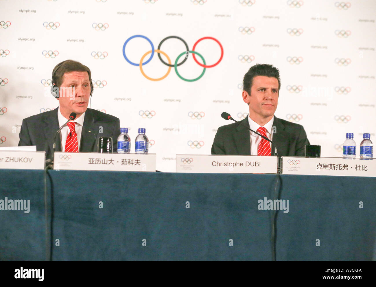 Alexander Zhukov, left, head of the 2022 Evaluation Commission for the International Olympic Committee (IOC), speaks next to Christophe Dubi, Sports D Stock Photo