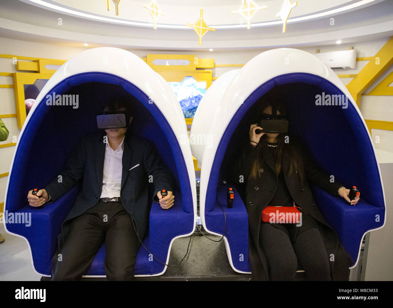 Visitors enjoy virtual space travels with VR (virtual reality) systems