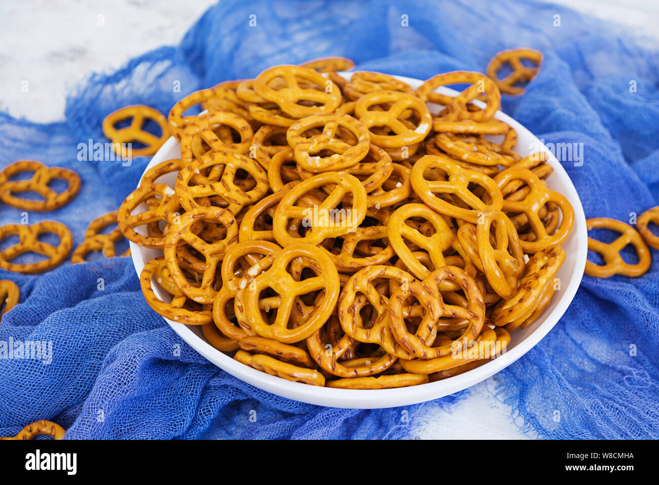 Salted pretzel on white background Stock Photo