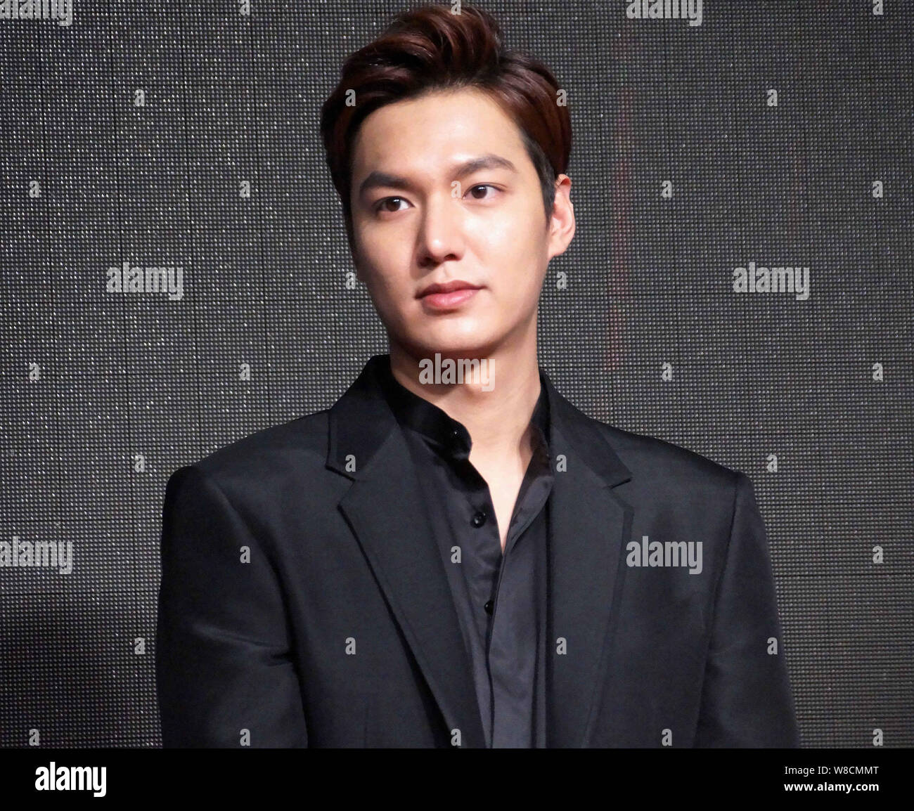 South Korean actor Lee Min-ho poses at a press conference for his movie "Bounty Hunters" during the 18th Shanghai International Film Festival in Shang Stock Photo