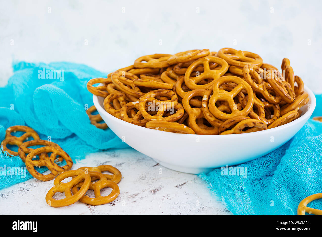 Salted pretzel on white background Stock Photo