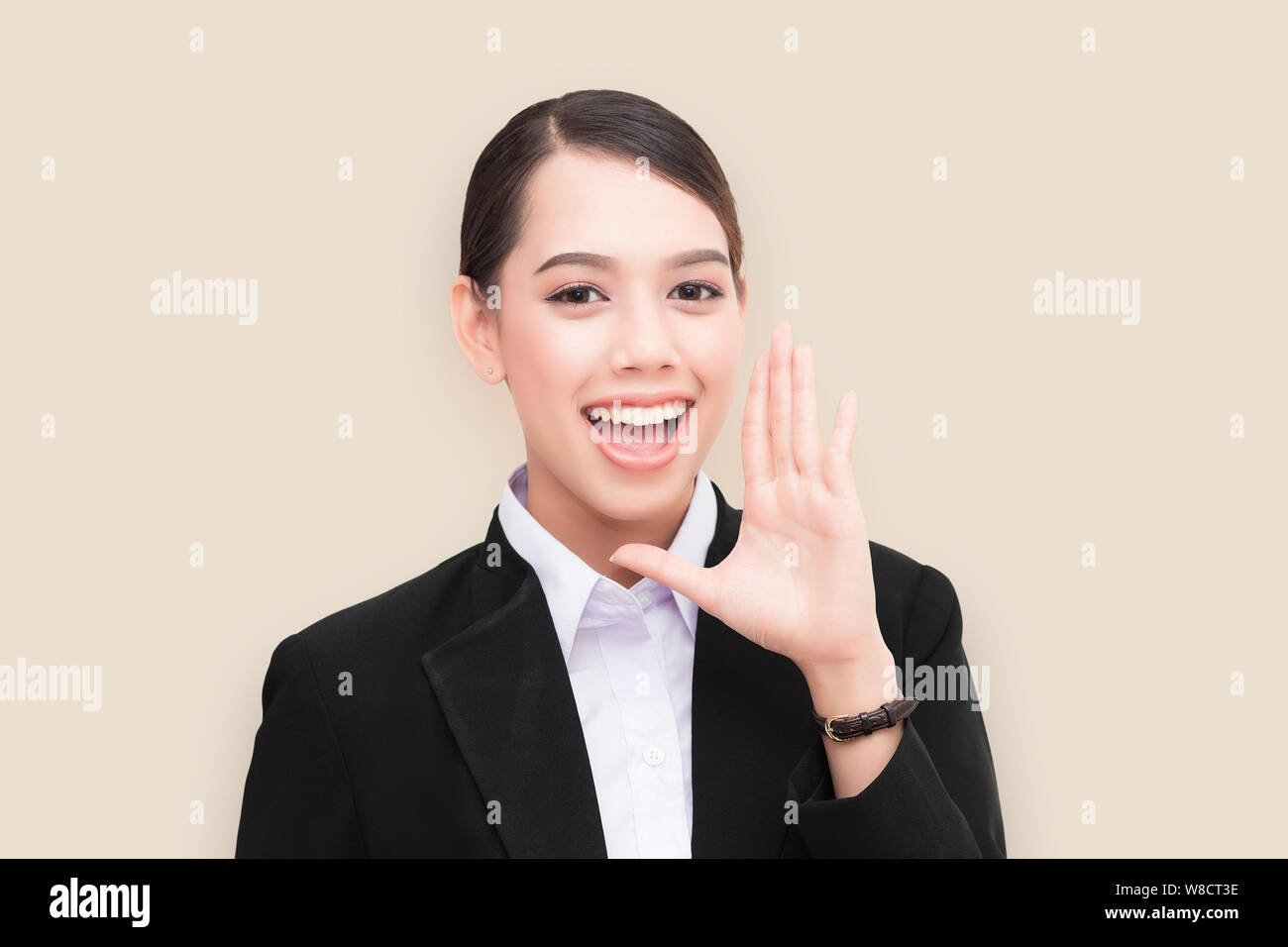 portrait of pretty businesswoman loud screaming or calling out to someone Stock Photo